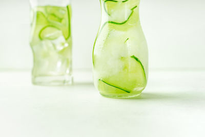 Close-up of drink against white background