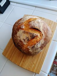 High angle view of bread on cutting board