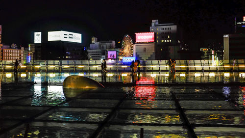 View of city lit up at night