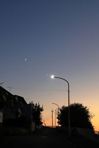 Street against sky at dusk