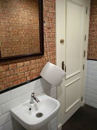 Close-up of faucet in bathroom