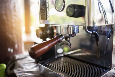 Close-up of coffee maker in cafe