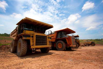 Tractors against sky