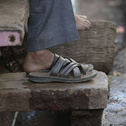 Low section of woman standing outdoors