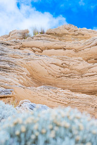 View of rock formation on land against sky