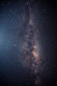 Low angle view of stars in sky at night