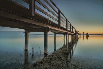 Bridge over sea against sky