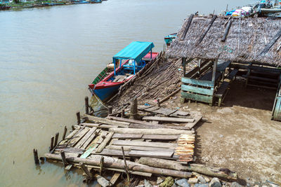 High angle view of fishing boats moored in river