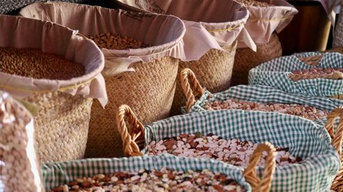 Full frame shot of different colourful beans in a basket