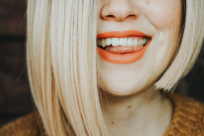 Close-up portrait of a smiling young woman