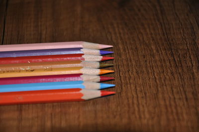 High angle view of multi colored pencils on table