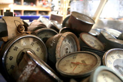 Close-up of abandoned hand compasses