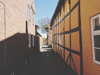 Narrow alley along buildings