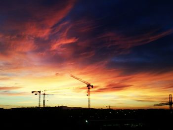 Silhouette of power lines at sunset