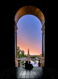 Archway of historic building against sky