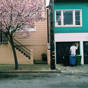 Woman standing in front of building