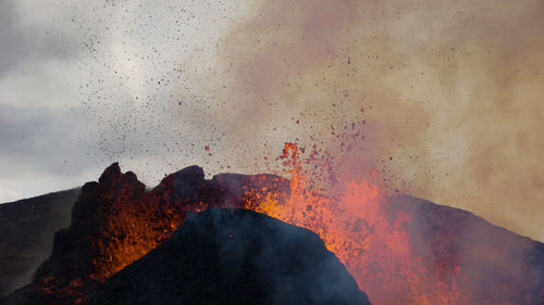 Scenic view of volcanic mountain against sky