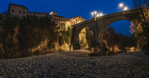 Low angle view of bridge over building