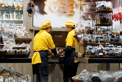 Men working at store