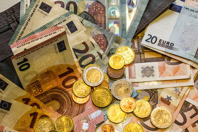 High angle view of coins on table