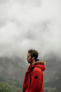 Young man looking away outdoors