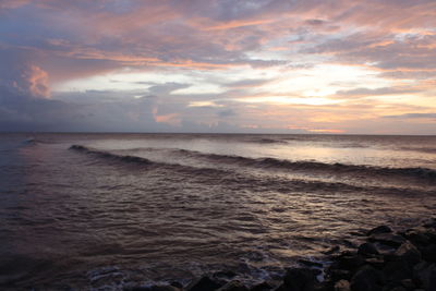 Scenic view of sea against sky during sunset