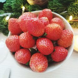 Close-up of strawberries in bowl on table