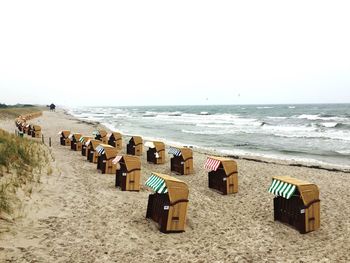 Panoramic view of beach against clear sky