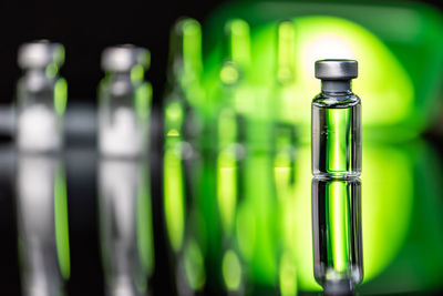 Close-up of empty glass bottles