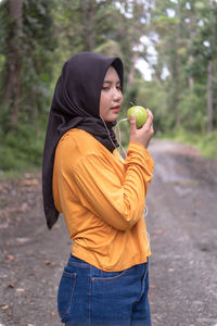 Young man drinking water