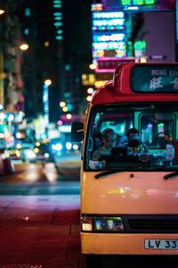 View of traffic on city street at night