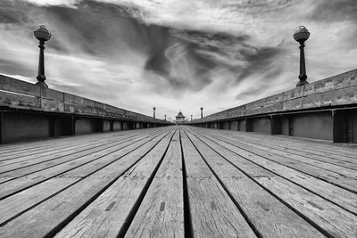 Surface level of footpath against sky