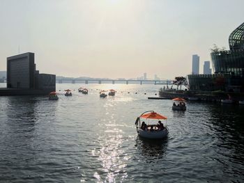 Nautical vessel on river against clear sky