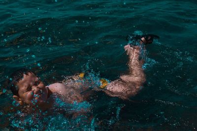 Man swimming in sea