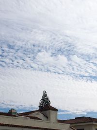 Low angle view of statue against sky