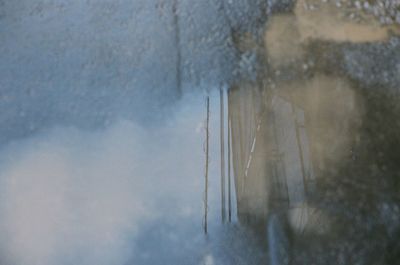 Close-up of snow against sky