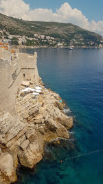 High angle view of bay against sky