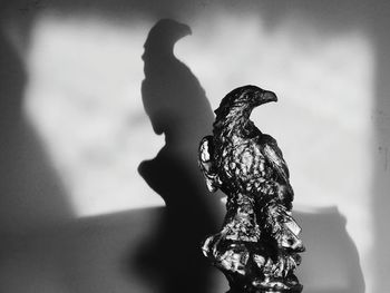 Close-up of bird statue