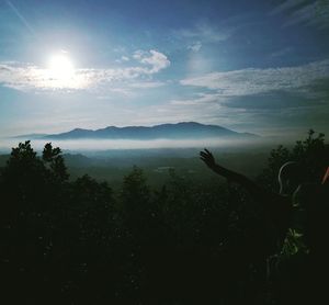 Scenic view of silhouette mountain against sky