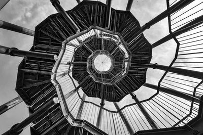 Low angle view of spiral staircase in building