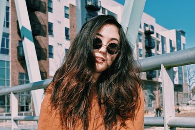 Portrait of young woman in sunglasses