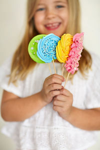 Portrait of girl holding ice cream