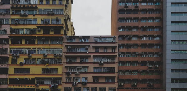 Low angle view of residential building against sky