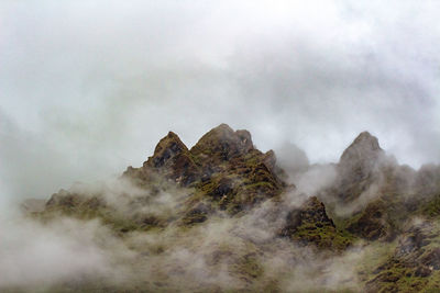 Scenic view of rocky mountains against sky