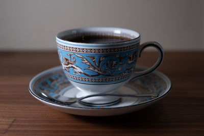 Close-up of coffee cup on table