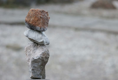 Close-up of rusty metal on rock