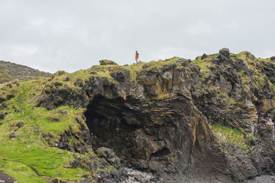 Rock formations on mountain against sky