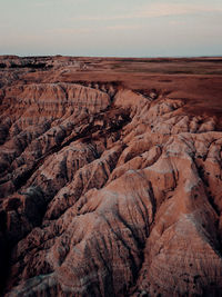 Scenic view of rocky landscape against sky