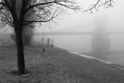 View of suspension bridge in foggy weather