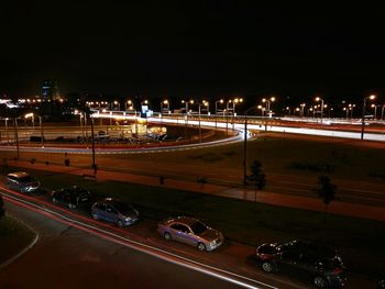 High angle view of light trails on road at night